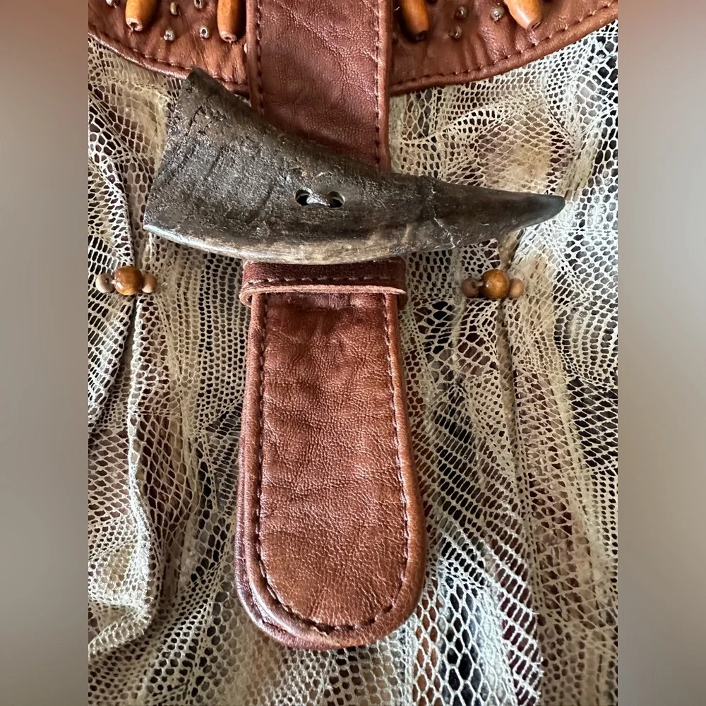 Mary Frances snakeskin print with brown trim & embellishments shoulder bag